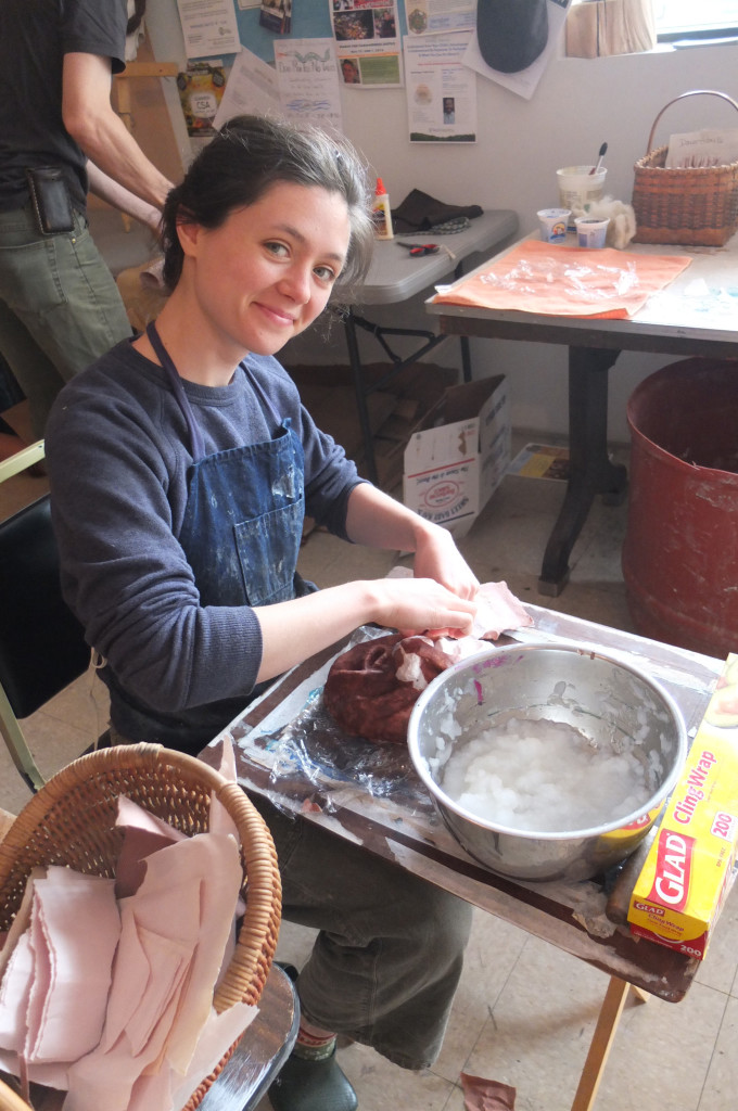 Emma Wade working on Paper mache puppet mask